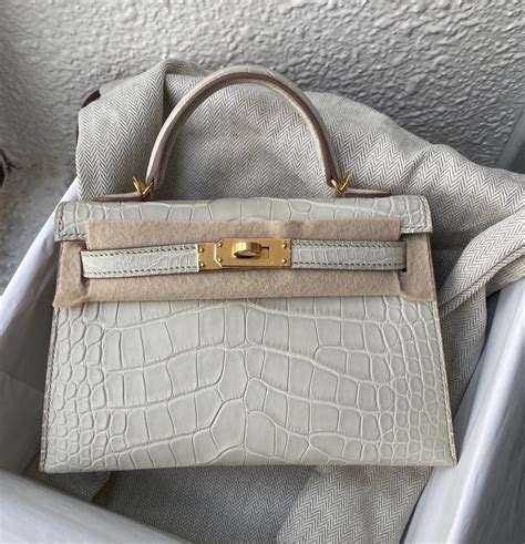 hermes kelly pochette alligator price|hermes mini kelly price.